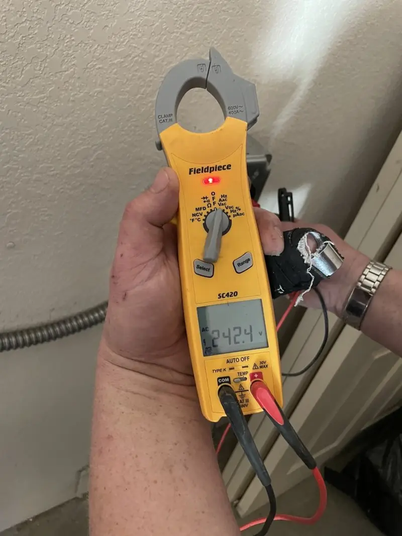Voltage testing with clamp meter during Generator Installation in Forest Acres